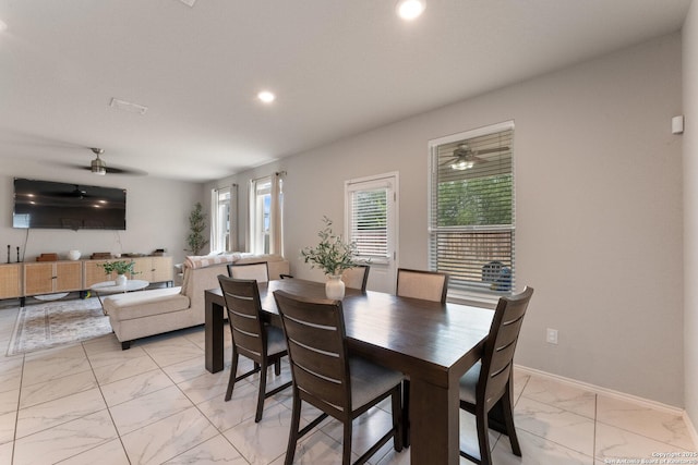 dining space with a ceiling fan, baseboards, marble finish floor, and recessed lighting