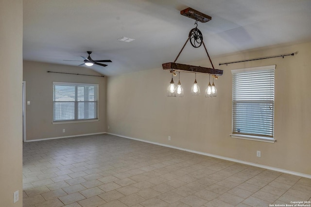 unfurnished room featuring light tile patterned floors, a ceiling fan, vaulted ceiling, and baseboards