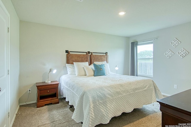 bedroom with recessed lighting, carpet flooring, and baseboards