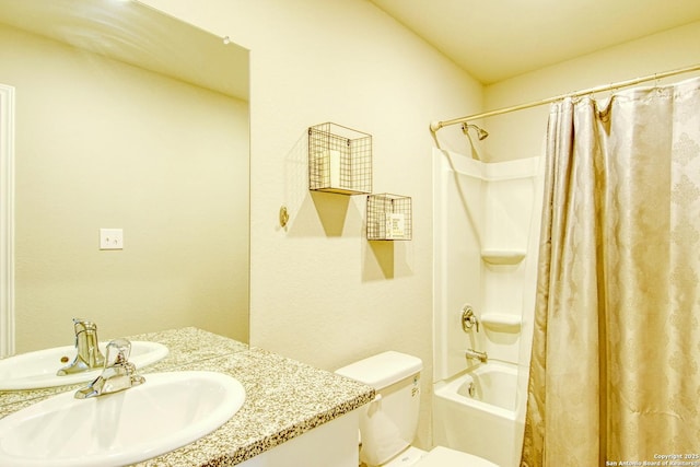 bathroom with toilet, shower / bath combo with shower curtain, and vanity