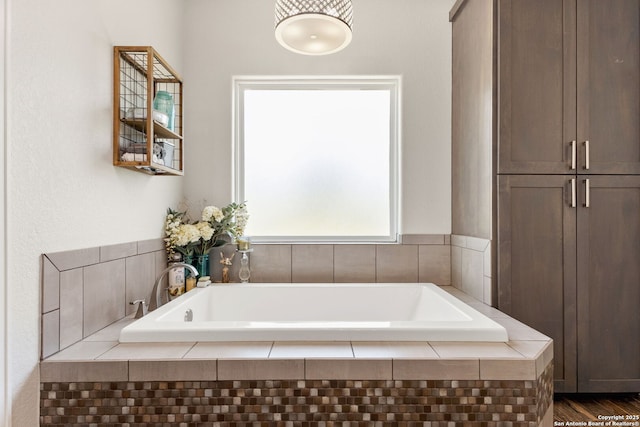 bathroom featuring a bath