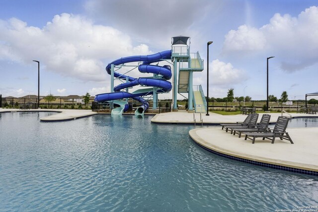 pool with a water slide