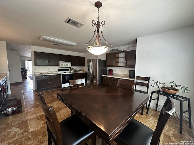 9528 Braun, San Antonio, TX 78254 - dining room with baseboards and visible vents