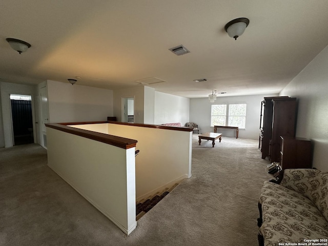 9528 Braun, San Antonio, TX 78254 - corridor featuring visible vents, an upstairs landing, and carpet flooring