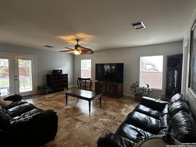 9528 Braun, San Antonio, TX 78254 - living area with ceiling fan, visible vents, french doors, and baseboards