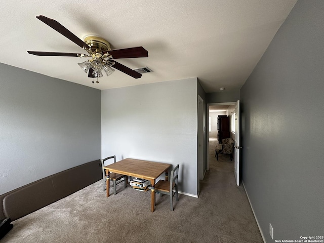 9528 Braun, San Antonio, TX 78254 - carpeted dining room featuring ceiling fan, baseboards, and visible vents