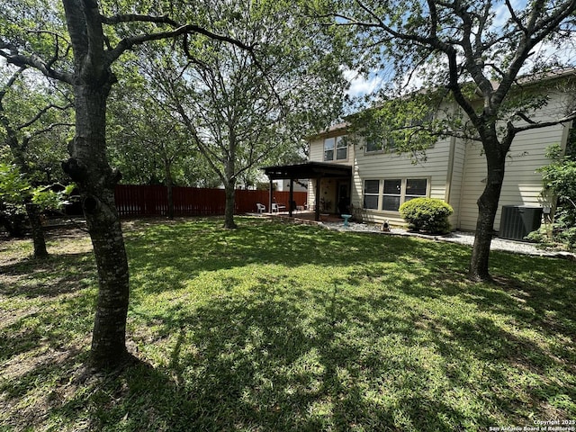 9528 Braun, San Antonio, TX 78254 - view of yard featuring a patio, fence, and central AC unit