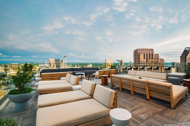 view of patio featuring an outdoor living space and a city view
