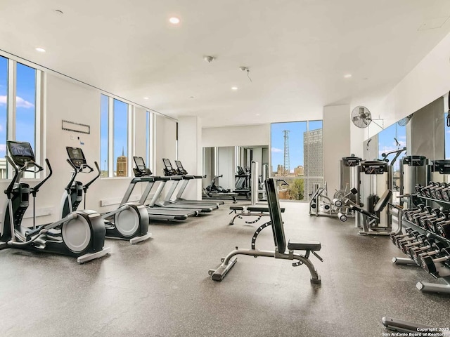 gym featuring recessed lighting