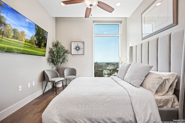 bedroom with recessed lighting, a ceiling fan, dark wood-style floors, and baseboards