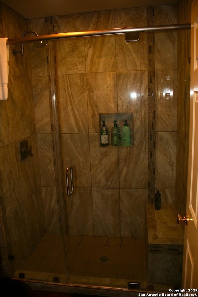 full bathroom featuring a stall shower