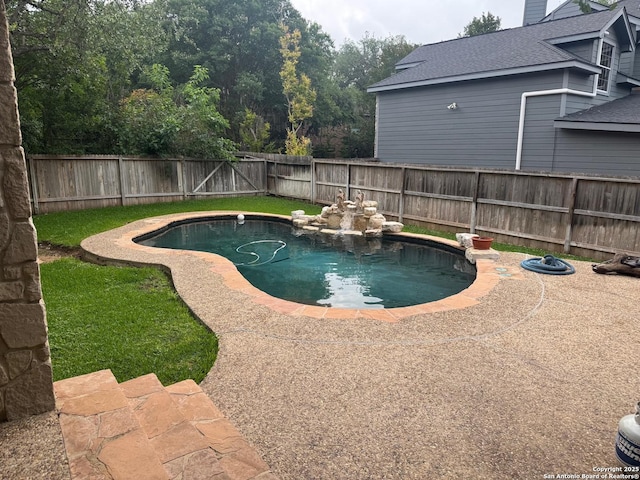 view of pool featuring a fenced in pool and a fenced backyard