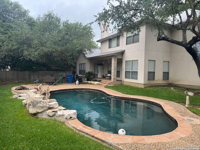1530 Pheasant Rdg, San Antonio, TX 78248 - view of pool with fence, a lawn, a patio, and a fenced in pool