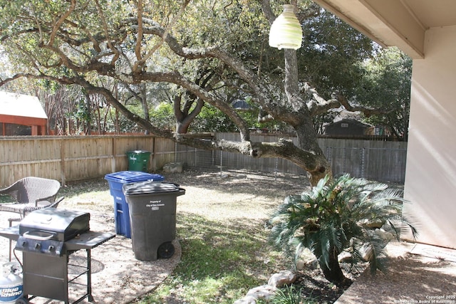 view of yard featuring a fenced backyard