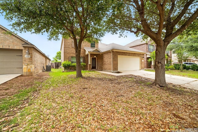 view of front of house featuring brick siding, fence, a garage, central AC unit, and concrete driveway
