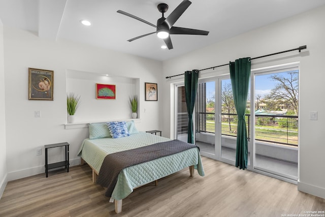 bedroom featuring wood finished floors, recessed lighting, access to exterior, and baseboards