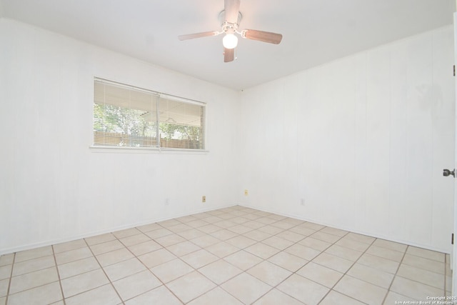 unfurnished room with a ceiling fan