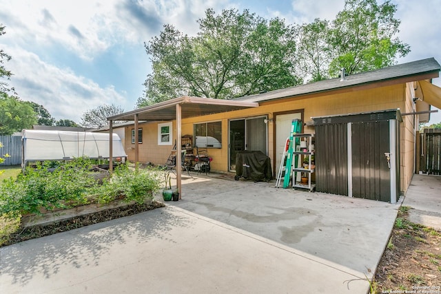 6835 Spring Hurst, San Antonio, TX 78249 - view of patio / terrace featuring fence and a vegetable garden