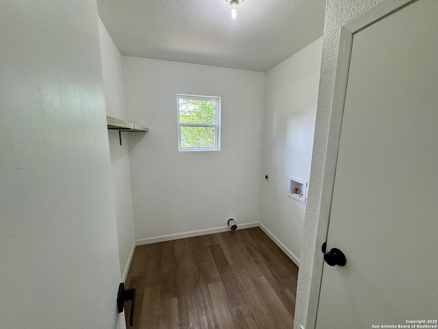 629 Melrose, Seguin, TX 78155 - clothes washing area featuring electric dryer hookup, dark wood-style floors, baseboards, hookup for a washing machine, and laundry area