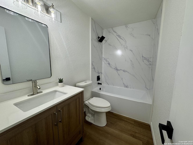 629 Melrose, Seguin, TX 78155 - bathroom featuring a textured wall, toilet, shower / bath combination, wood finished floors, and vanity