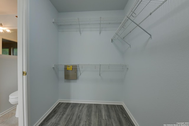 6015 Wexford Pl, San Antonio, TX 78240 - spacious closet with wood finished floors