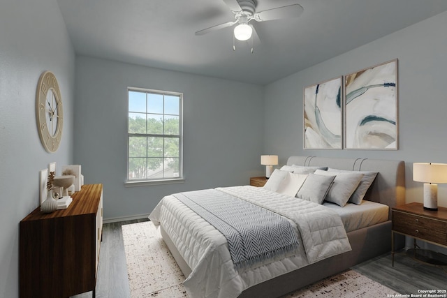 6015 Wexford Pl, San Antonio, TX 78240 - bedroom with baseboards, wood finished floors, and ceiling fan