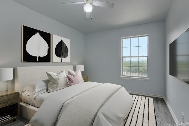 6015 Wexford Pl, San Antonio, TX 78240 - bedroom featuring ceiling fan, wood finished floors, and baseboards