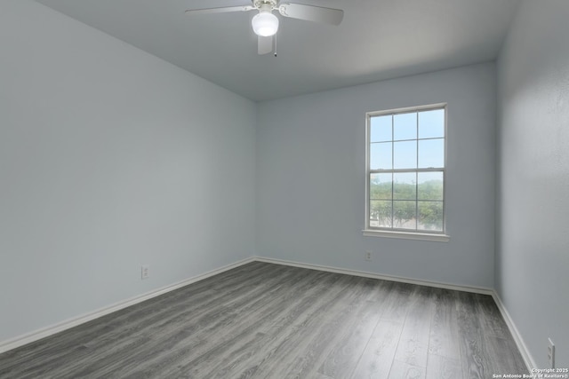 6015 Wexford Pl, San Antonio, TX 78240 - spare room featuring baseboards, wood finished floors, and ceiling fan
