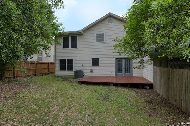6015 Wexford Pl, San Antonio, TX 78240 - back of property featuring a deck, a yard, central AC, and a fenced backyard