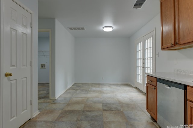 6015 Wexford Pl, San Antonio, TX 78240 - interior space featuring visible vents, brown cabinets, dishwasher, and light countertops