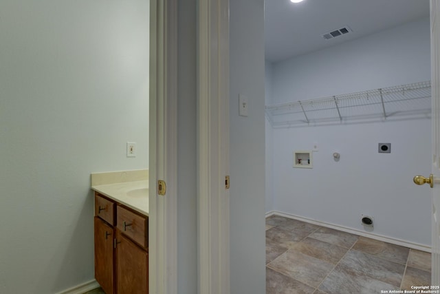6015 Wexford Pl, San Antonio, TX 78240 - laundry area with hookup for an electric dryer, hookup for a gas dryer, visible vents, hookup for a washing machine, and laundry area