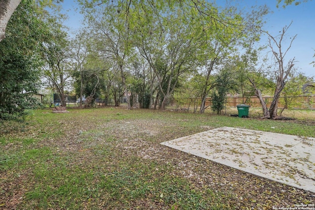 view of yard with a fenced backyard and a patio area