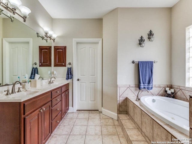full bath featuring double vanity, a bath, tile patterned flooring, and a sink