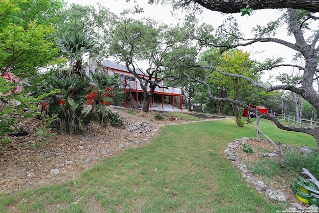 view of yard featuring a wooden deck