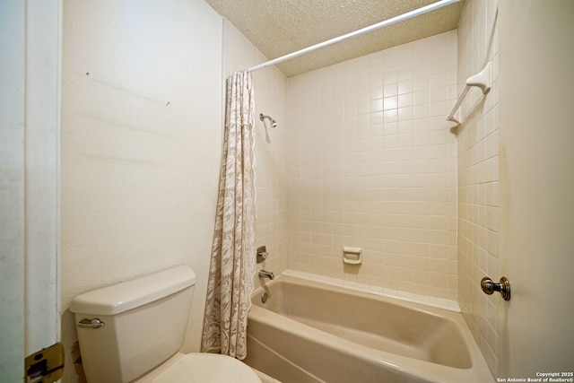 full bathroom with shower / bathtub combination with curtain, toilet, and a textured ceiling