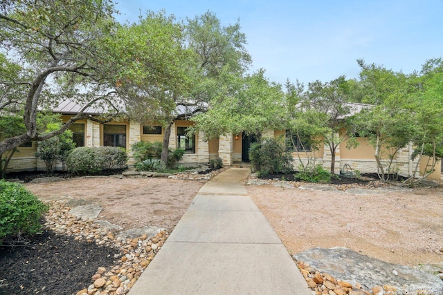 view of front facade featuring stone siding