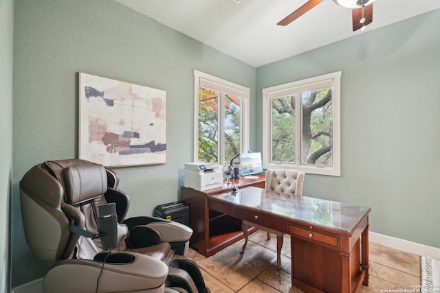 office with baseboards and ceiling fan