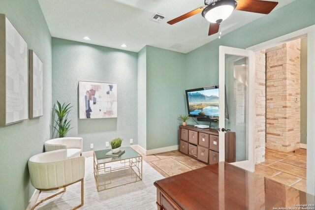 tiled living area featuring baseboards, visible vents, ceiling fan, and recessed lighting