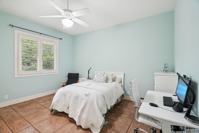 bedroom with baseboards, tile patterned floors, and ceiling fan