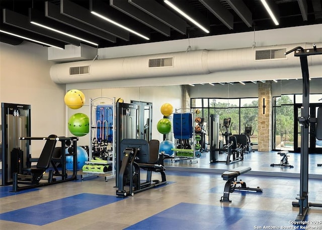 exercise room featuring visible vents