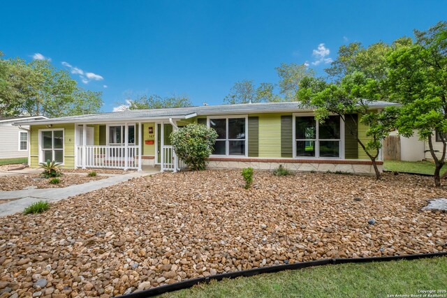 ranch-style house featuring a porch