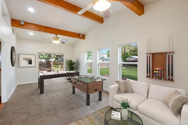 game room featuring ceiling fan, baseboards, and plenty of natural light