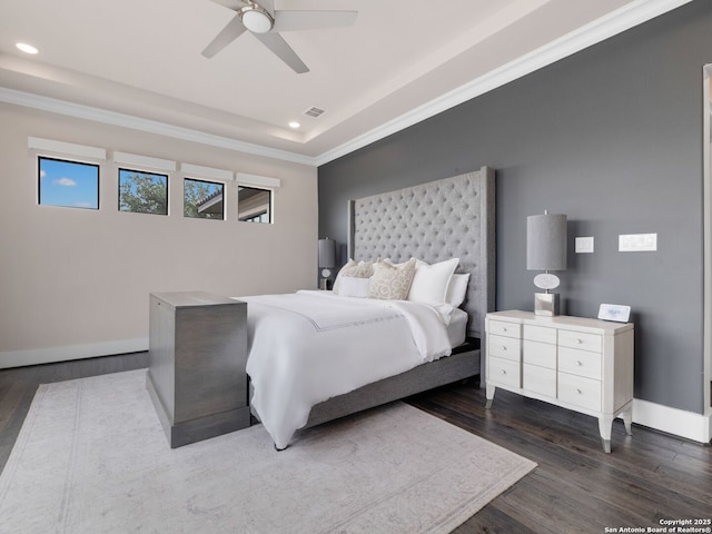 bedroom featuring ornamental molding, recessed lighting, wood finished floors, and baseboards