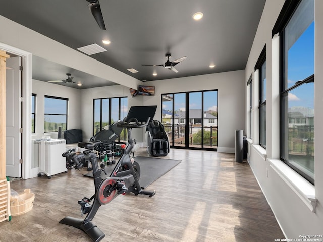 exercise area featuring visible vents, wood finished floors, a ceiling fan, and recessed lighting