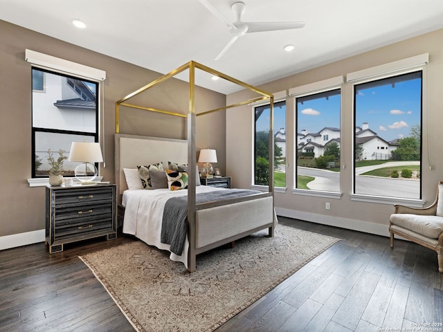 bedroom with dark wood-style floors, a ceiling fan, recessed lighting, and baseboards