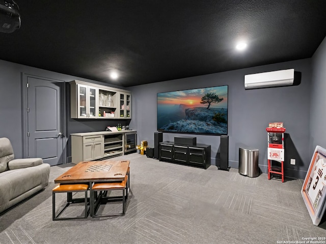 cinema room with recessed lighting, an AC wall unit, and carpet flooring