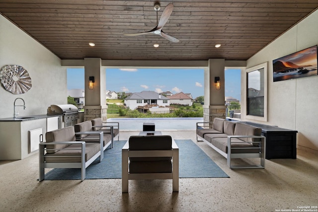 view of patio featuring an outdoor hangout area, area for grilling, a sink, a ceiling fan, and a grill