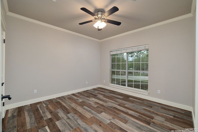 unfurnished room featuring dark wood finished floors, baseboards, and ornamental molding