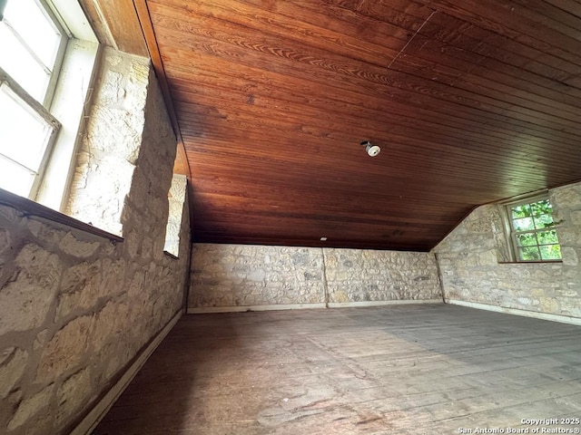 bonus room with wooden ceiling, hardwood / wood-style flooring, and lofted ceiling