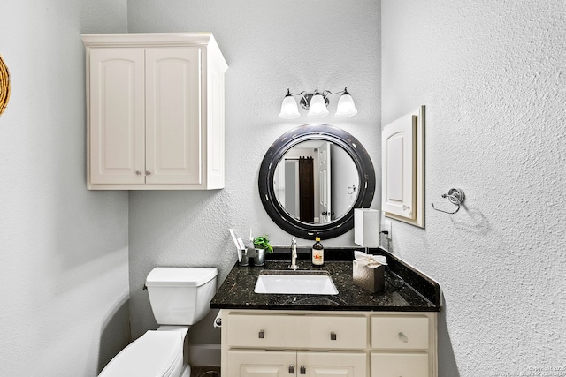half bath with toilet and vanity